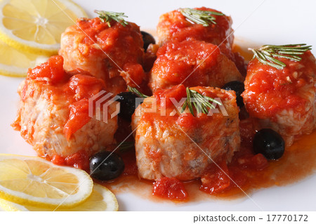 fish in tomato sauce with olives closeup 17770172