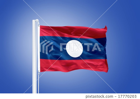 Flag of Laos flying against a blue sky Flag of Laos flying against a blue sky 17770203