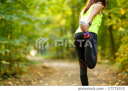 woman exercising and stretching muscles woman exercising and stretching muscles 17778355
