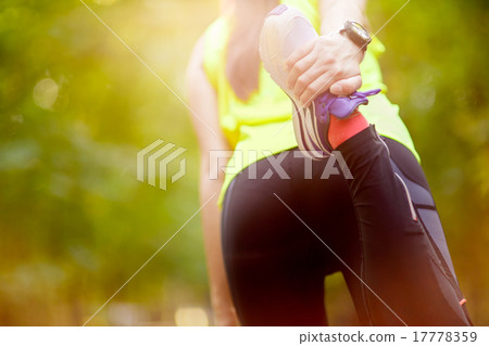 woman exercising with bent leg 17778359