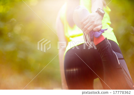 woman exercising with bent leg woman exercising with bent leg 17778362