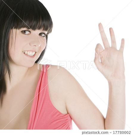 picture of young brunette showing ok sign over picture of young brunette showing ok sign over 17780002