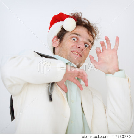 Portrait of scared person in a New Year hat Portrait of scared person in a New Year hat 17780770
