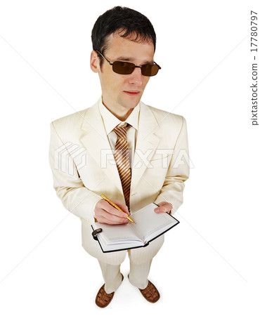 Man in a light suit with a notebook on white background Man in a light suit with a notebook on white background 17780797