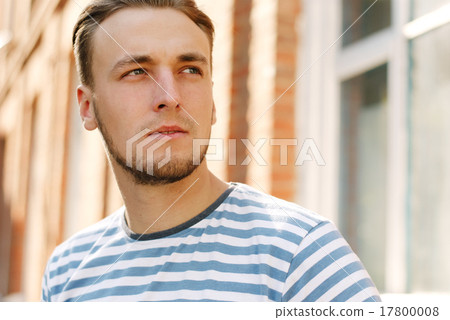 Portrait of a young man with a beard 17800008