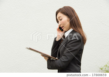 A woman with a binder A woman with a binder 17800659