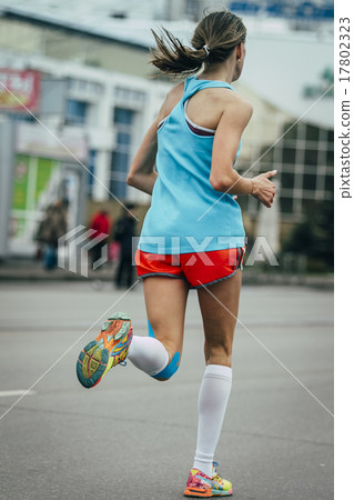 young girl running a marathon 17802323