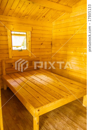 small log cabin interior with bed and window small log cabin interior with bed and window 17805133