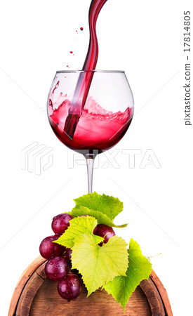 Glass of red wine on a wooden barrel with grape Glass of red wine on a wooden barrel with grape 17814805