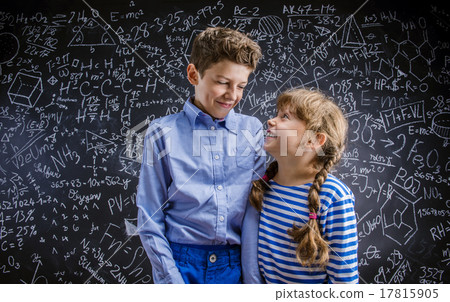 Cute little boy and girl in front of a big Cute little boy and girl in front of a big 17815905