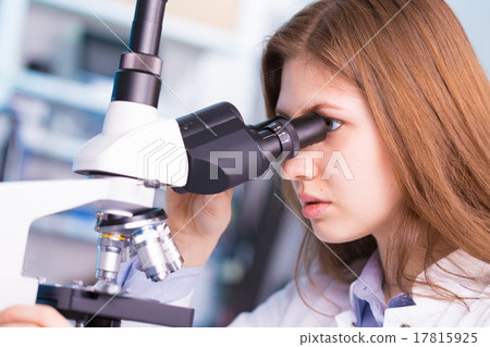 Young woman witch blonde long hair testing blood on RBC, HGB and Young woman witch blonde long hair testing blood on RBC, HGB and 17815925