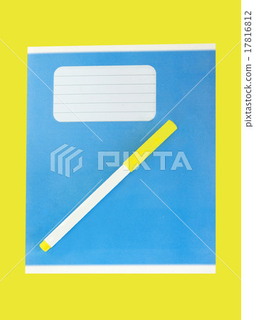 Blue writing book on a yellow background. Blue writing book on a yellow background. 17816812
