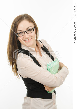 Portrait  young teacher with a notebook in hands 17817440