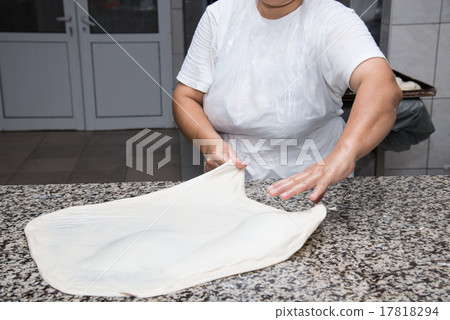 female hands kneading dough and making banitsa female hands kneading dough and making banitsa 17818294