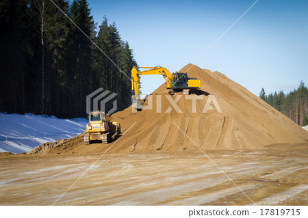 Yellow excavator at work 17819715
