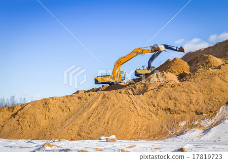 Yellow excavator at work 17819723