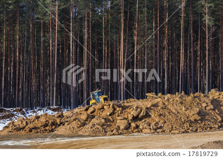 Yellow excavator at work Yellow excavator at work 17819729