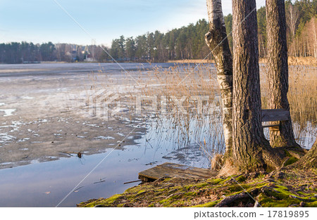 early spring with melting ice and snow 17819895