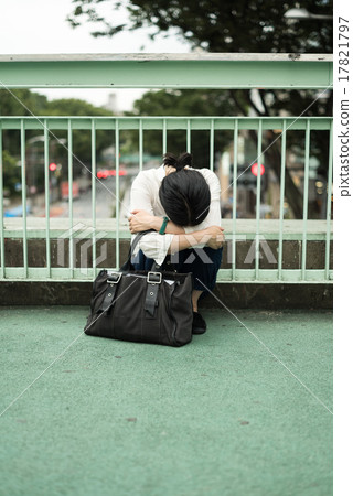 A woman crawling on the street A woman crawling on the street 17821797