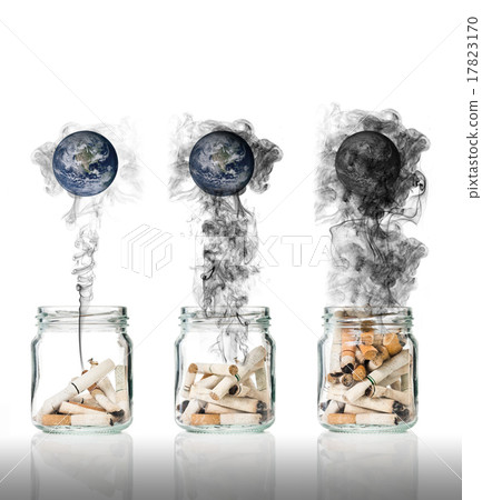 Cigarette butt in bottle with smoke Burning the world, world no 17823170