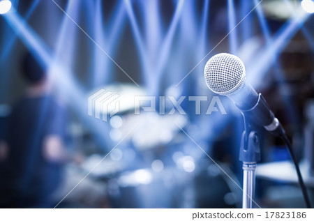 Close up of microphone on musician blurred background Close up of microphone on musician blurred background 17823186