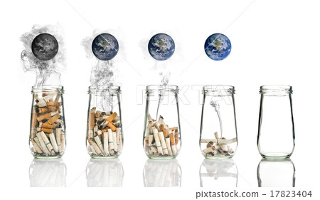 Cigarette butt in bottle with smoke Burning the world, world no 17823404