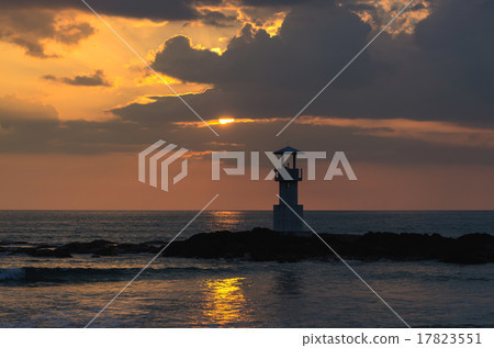 Seascape at sunset with Lighthouse on the coast 17823551