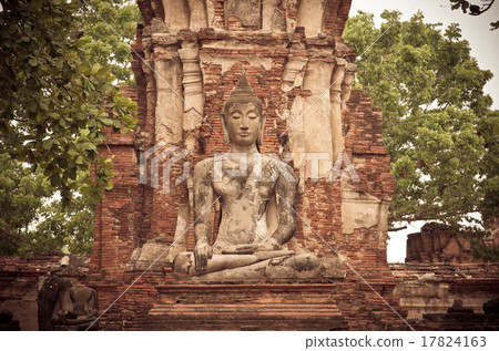 Buddha statue in Wat Mahathat. Ayutthaya historical park, public Buddha statue in Wat Mahathat. Ayutthaya historical park, public 17824163