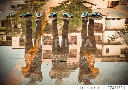 Three man reflection in the water after raining, double exposure 17824234