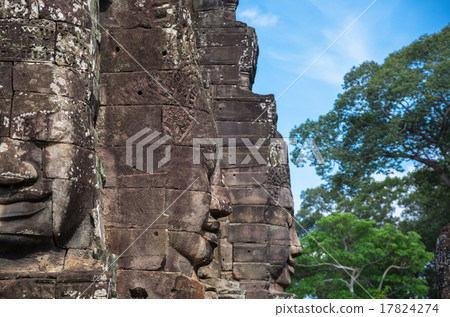 Stone face of Ancient Bayon Temple at Angkor Thom. Siem Reap, Ca 17824274
