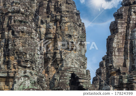 Stone face of Ancient Bayon Temple at Angkor Thom. Siem Reap, Ca Stone face of Ancient Bayon Temple at Angkor Thom. Siem Reap, Ca 17824399