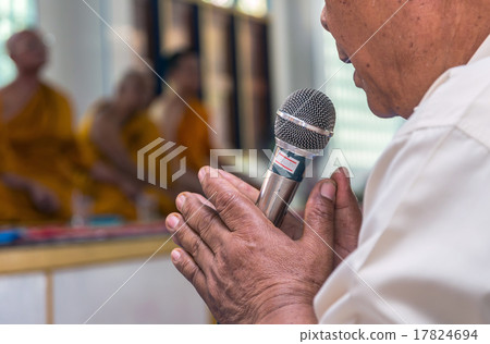 Microphone on hand of The ordination ceremonyprocess with monk b Microphone on hand of The ordination ceremonyprocess with monk b 17824694