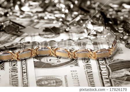 Heap of jewelry at money Heap of jewelry at money 17826170