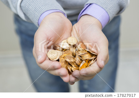 Handful of coins in palm hands 17827017