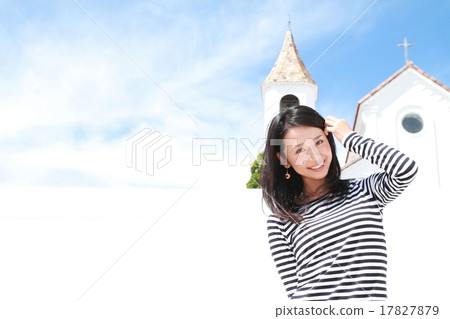 Beautiful young lady with long hair with blue sky back 17827879