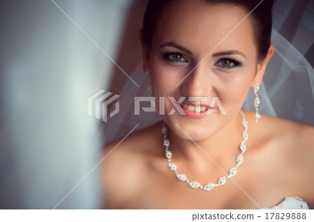 Happy Bride looking in window Happy Bride looking in window 17829888