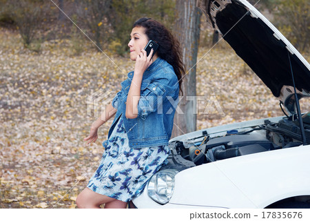 Woman with broken car talk on phone 17835676