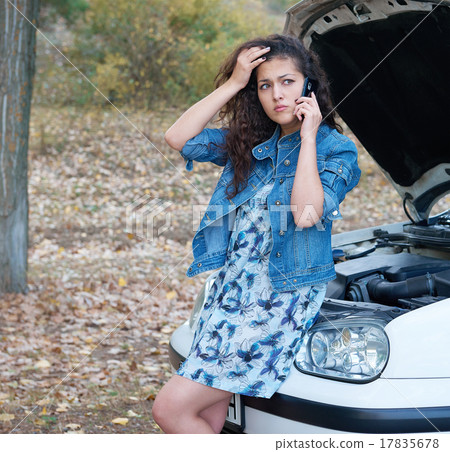 Woman with broken car talk on phone 17835678