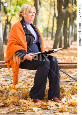 pregnant woman in autumn park 17836500