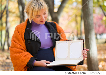 pregnant woman in autumn park 17836519