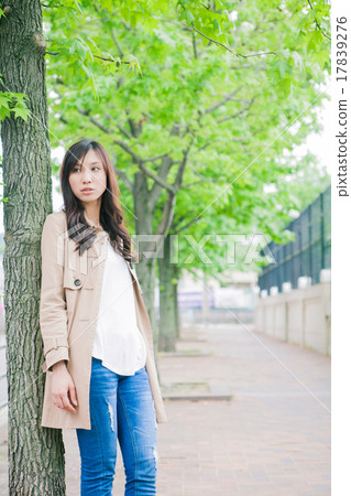 A woman walking in the city 17839276