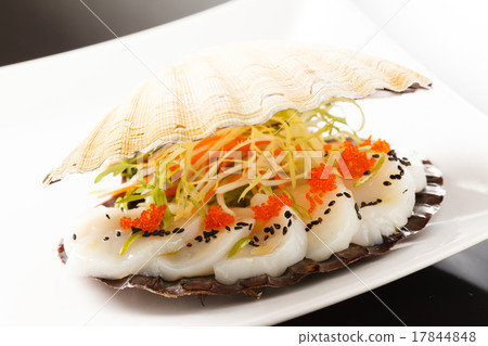 scallops presented on a scallop shell scallops presented on a scallop shell 17844848