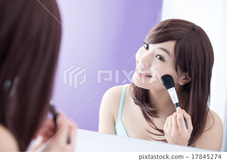 Smile woman with makeup brushes Smile woman with makeup brushes 17845274