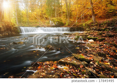 waterfall with a shining sun 17845495