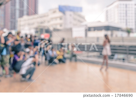 Defocussed of Photographers shooting a woman Defocussed of Photographers shooting a woman 17846690