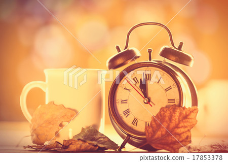 Vintage alalrm clock and cup Vintage alalrm clock and cup 17853378