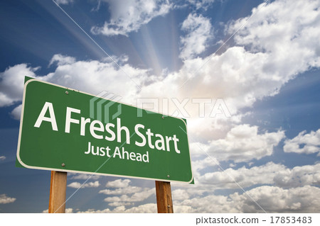 A Fresh Start Green Road Sign Over Clouds 17853483