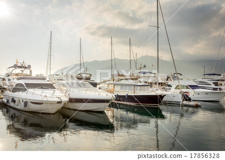 Beautiful white modern yachts at sea port Beautiful white modern yachts at sea port 17856328