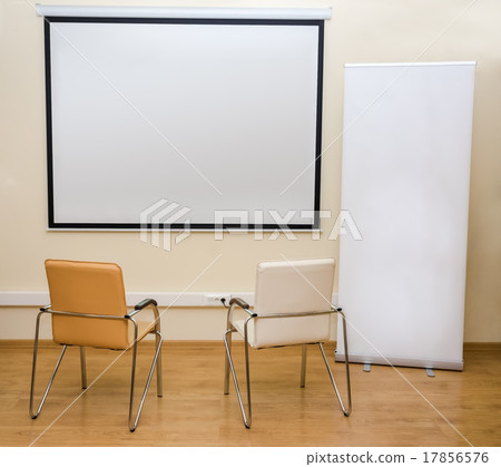 Blank white screen, roll-up banner and two chairs Blank white screen, roll-up banner and two chairs 17856576