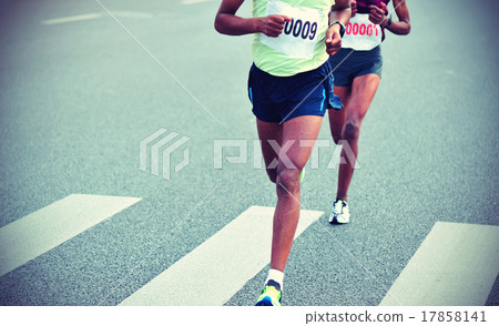 Marathon running race, people feet on city road Marathon running race, people feet on city road 17858141